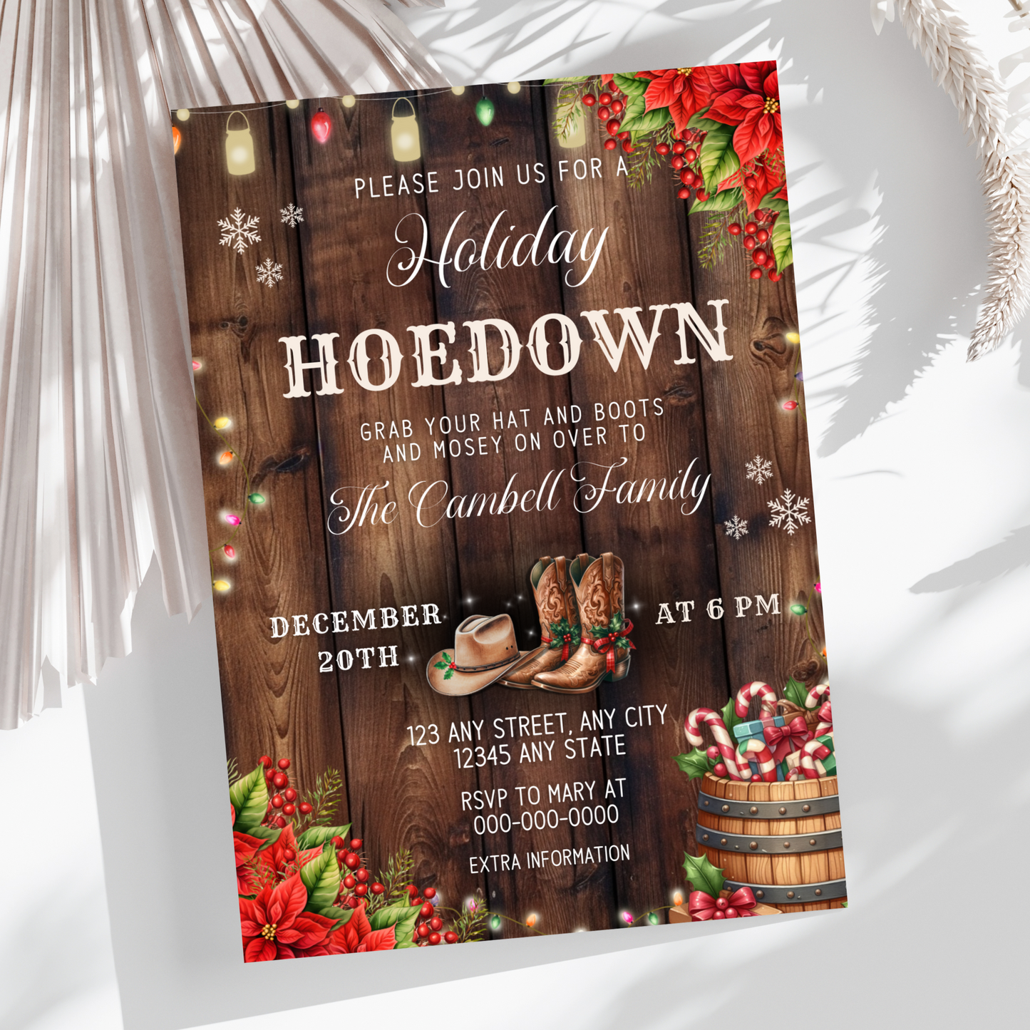 Ho Ho Hoedown holiday party invitation with a festive Western vibe